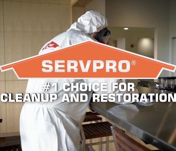 Servpro guy in suit cleaning